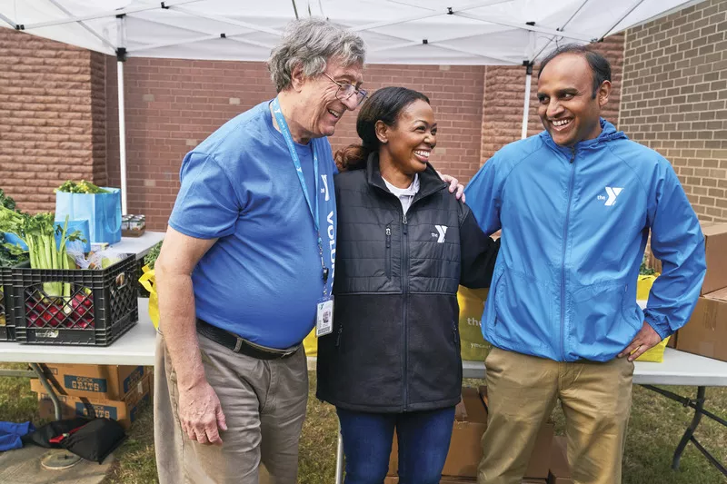 YMCA employees and volunteers having fun while working