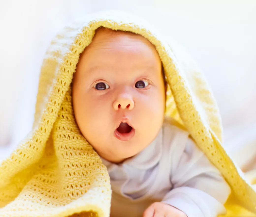 infant in blanket