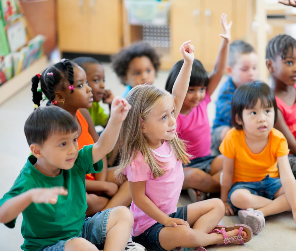 preschools raising their hands