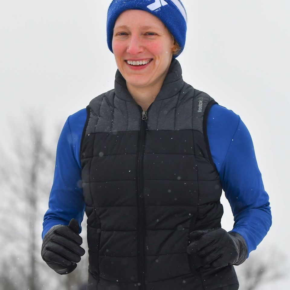 Photo of Sara Dow running outdoors