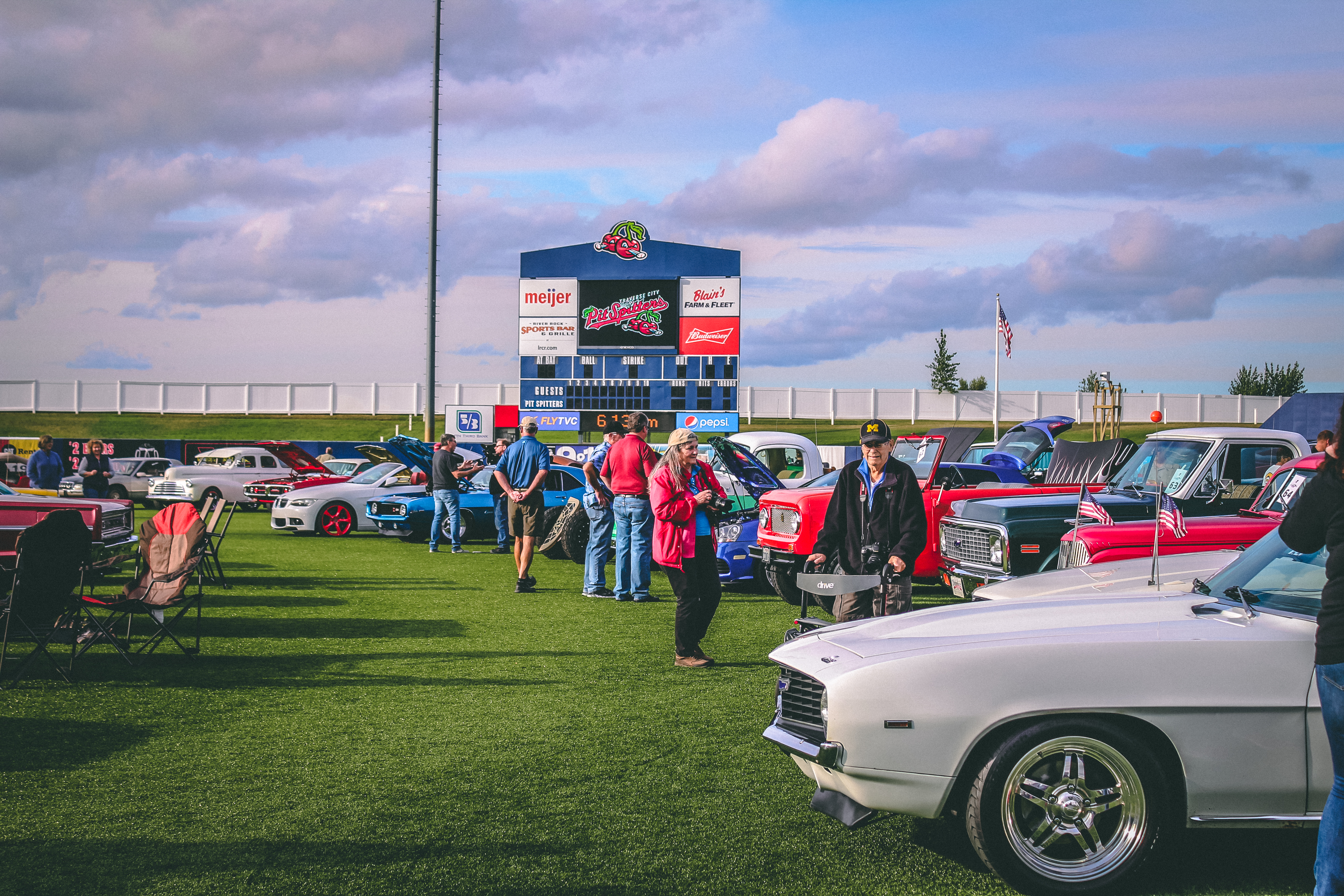 Classic cars on a baseball diamond