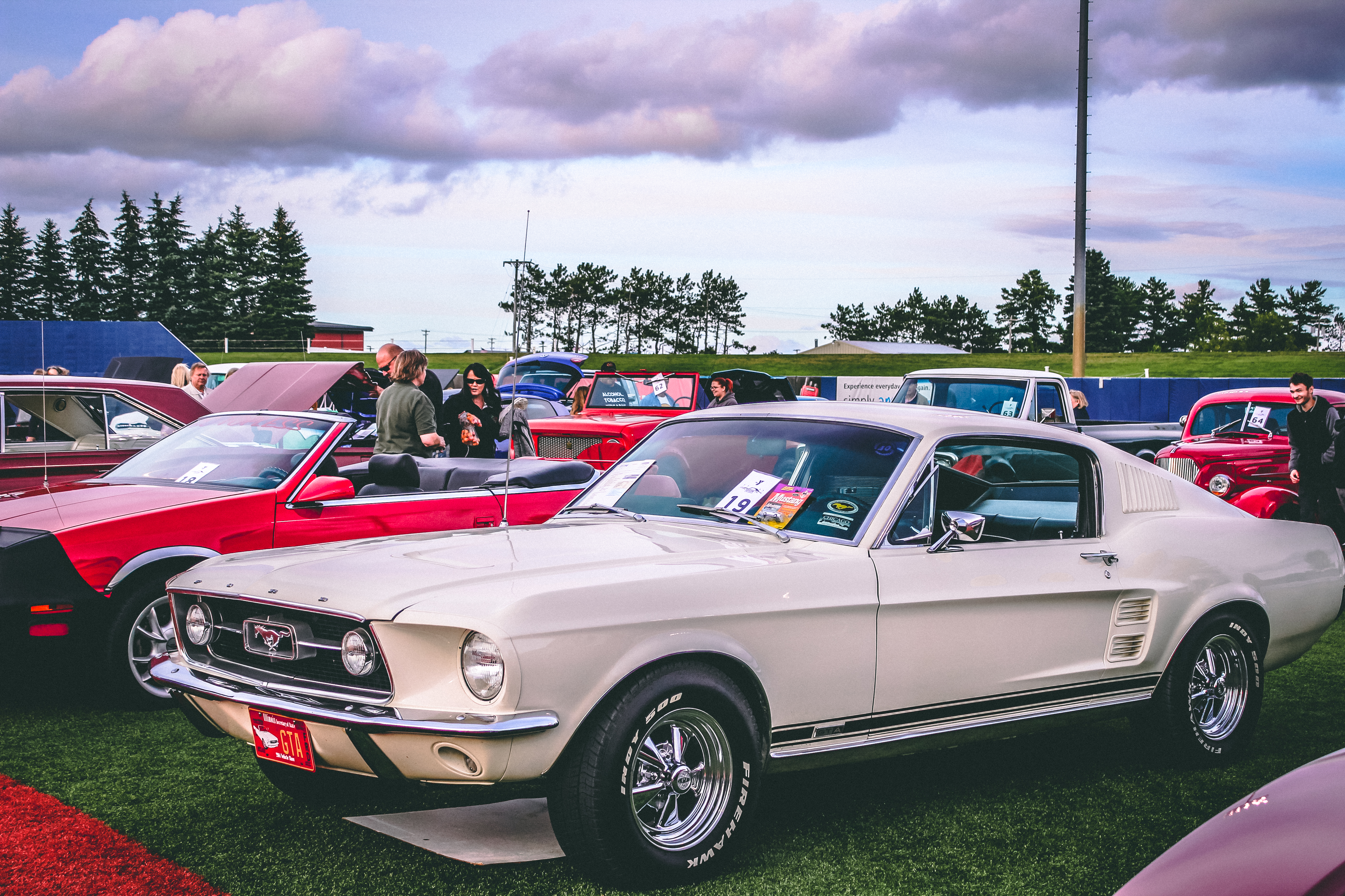 Classic cars on a baseball diamond