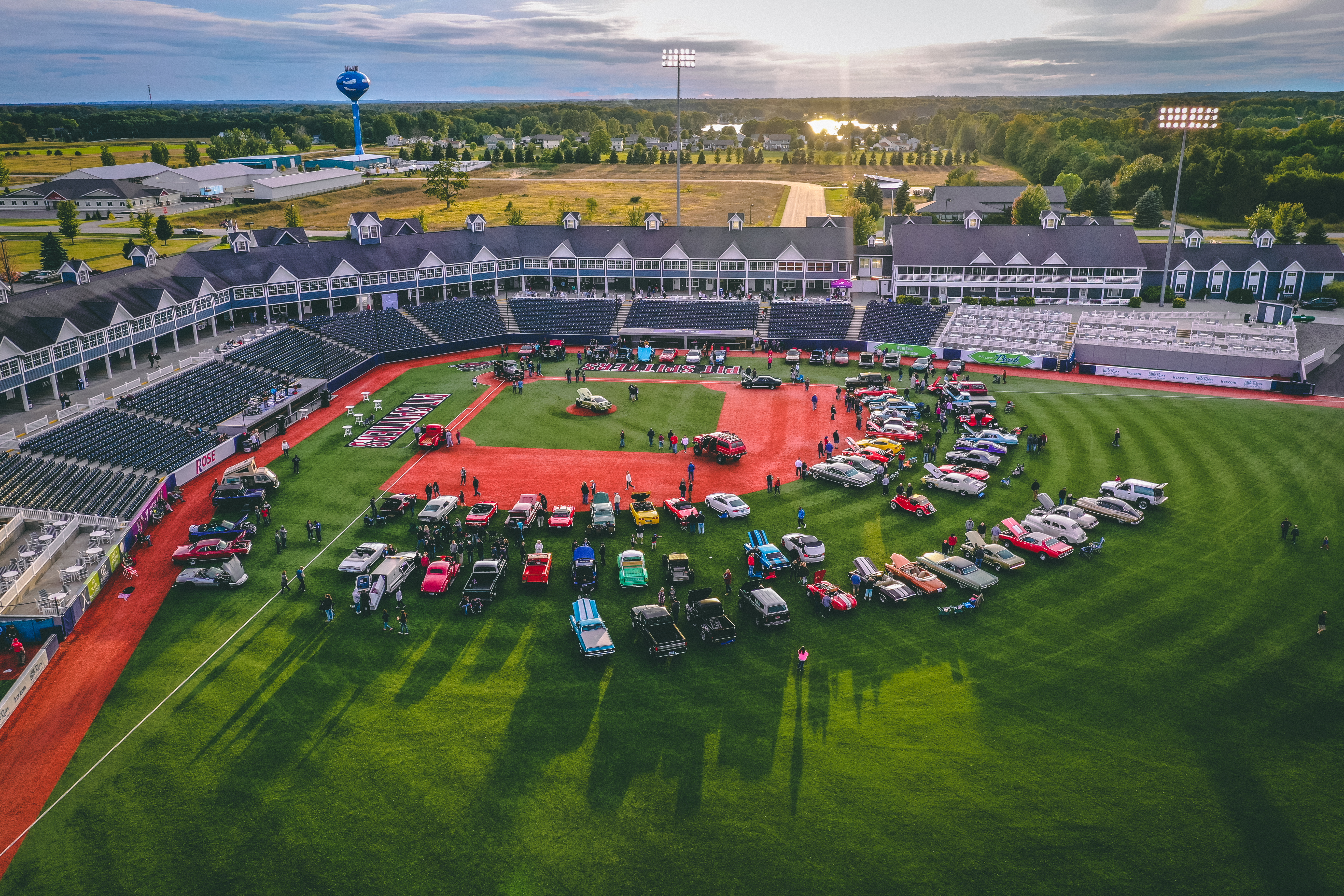 Classic cars on a baseball diamond