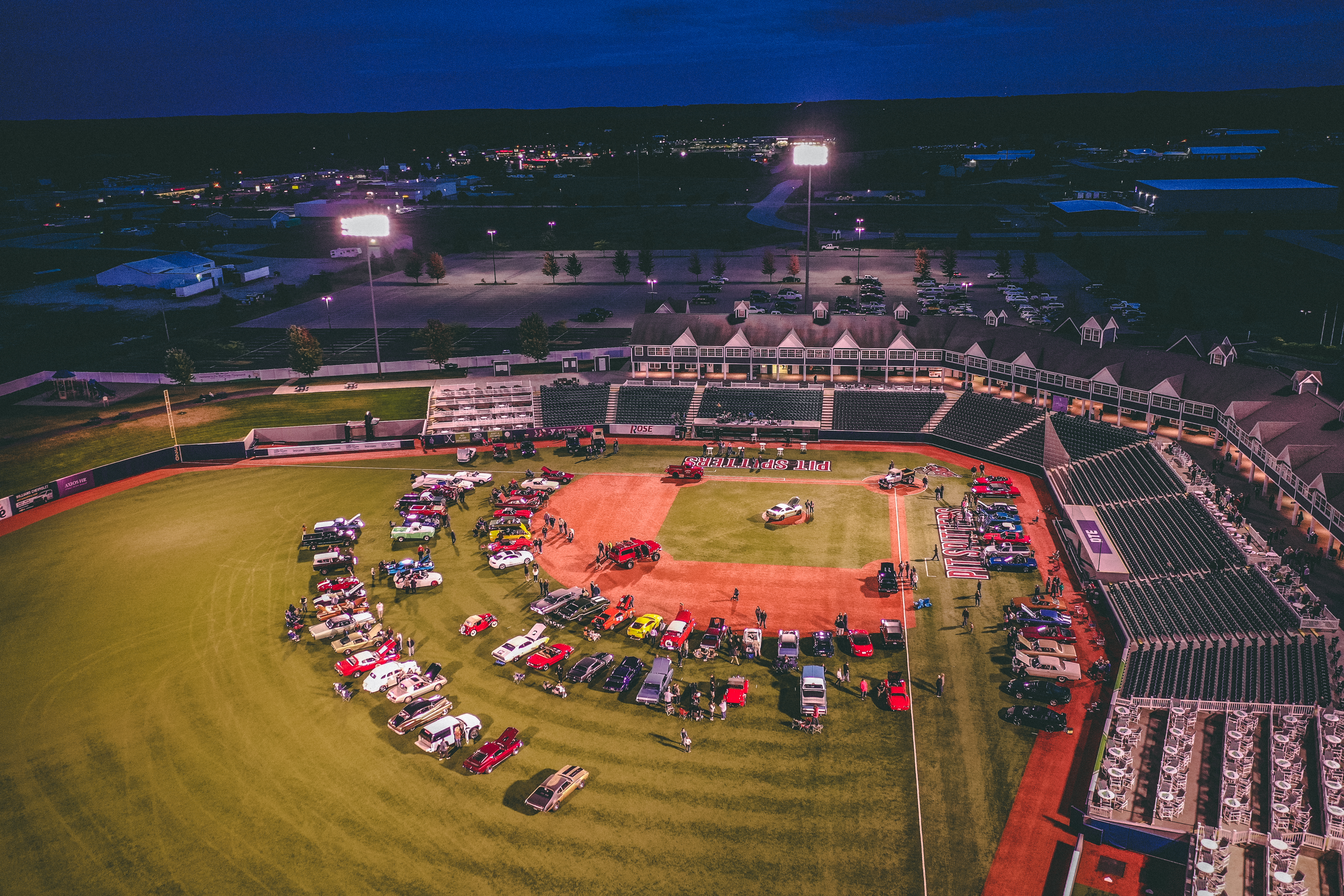 Classic cars on a baseball diamond