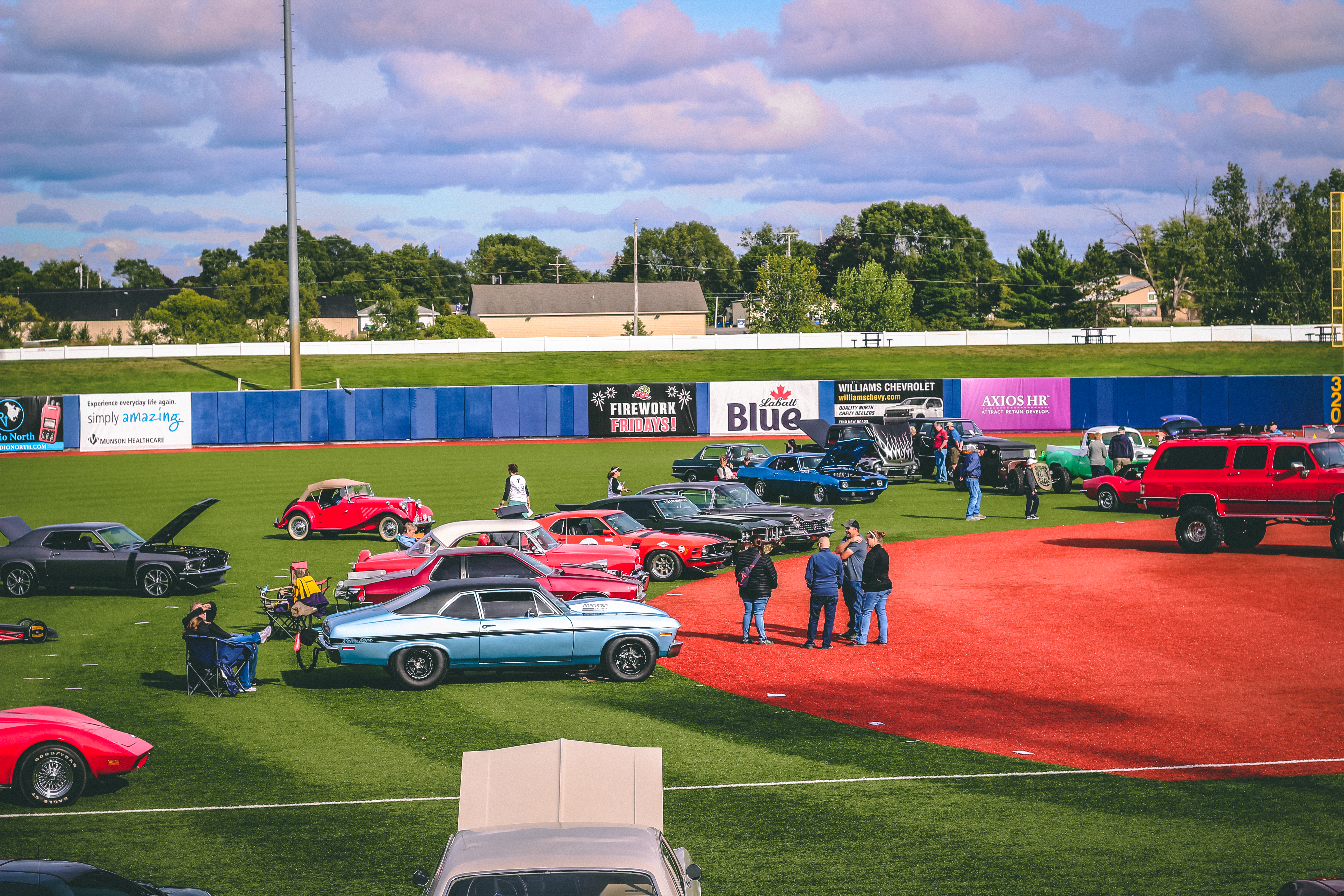 Classic cars on a baseball diamond