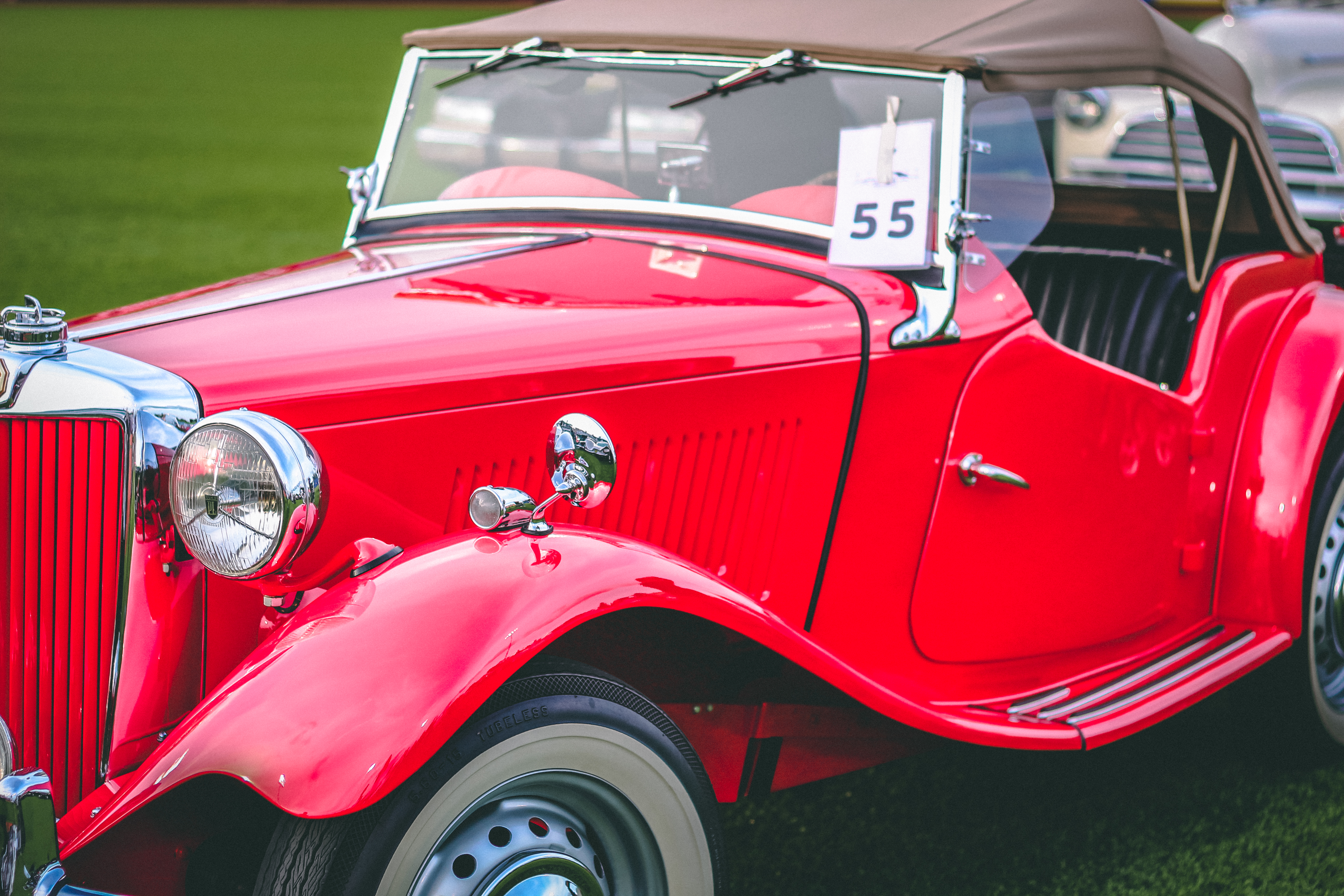 Classic cars on a baseball diamond