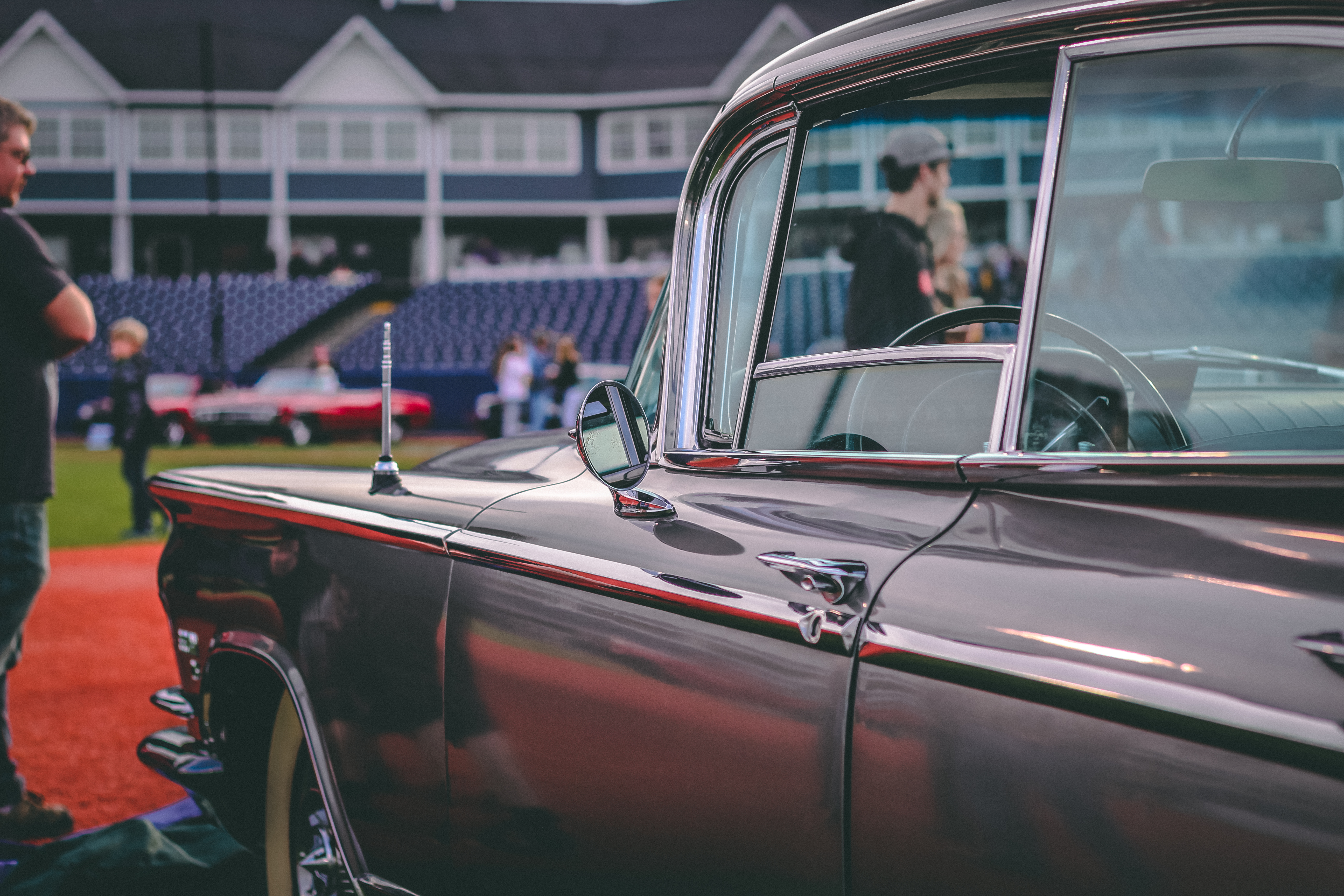 Classic cars on a baseball diamond