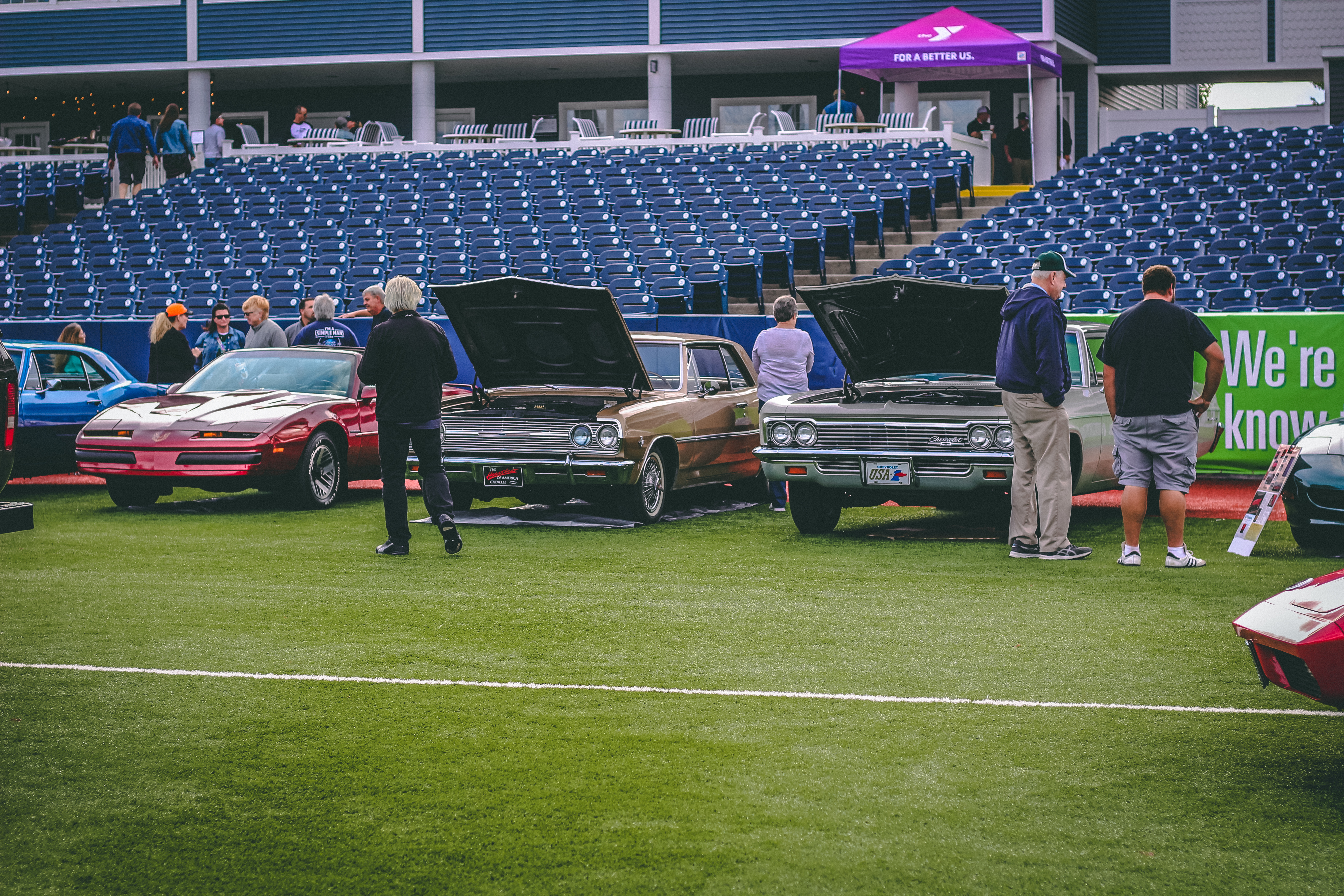 Classic cars on a baseball diamond