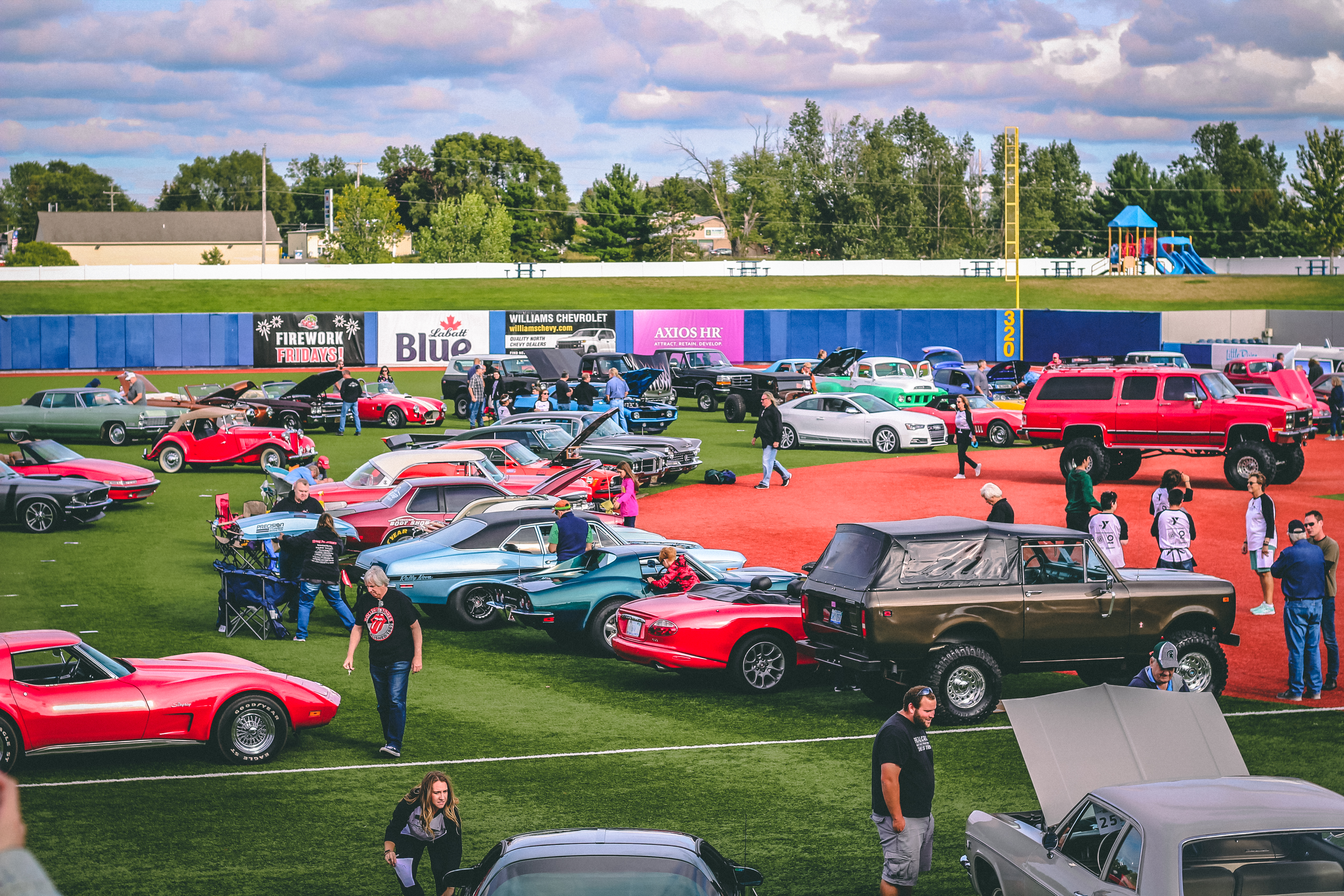 Classic cars on a baseball diamond