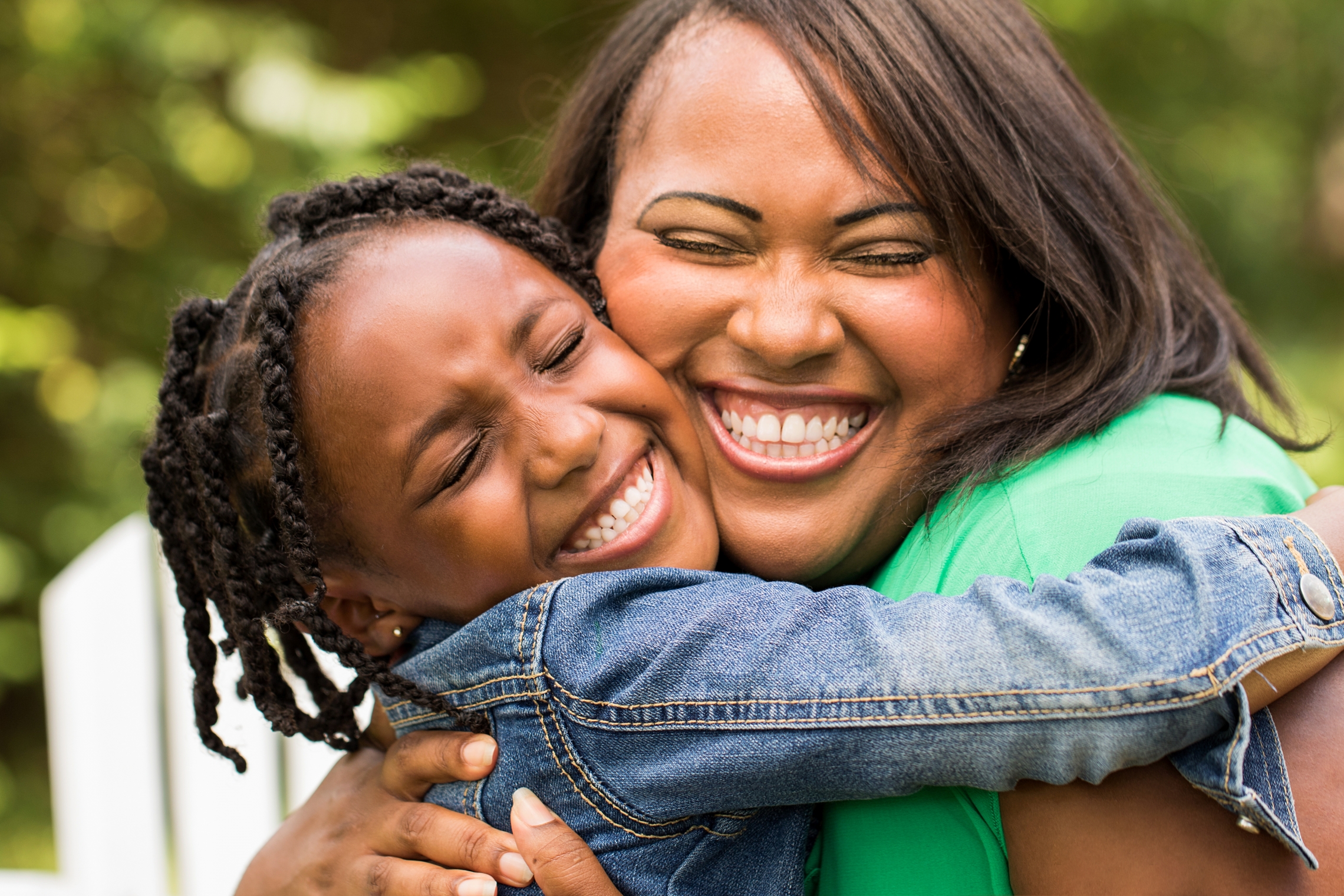 Mom Hugging Daughter