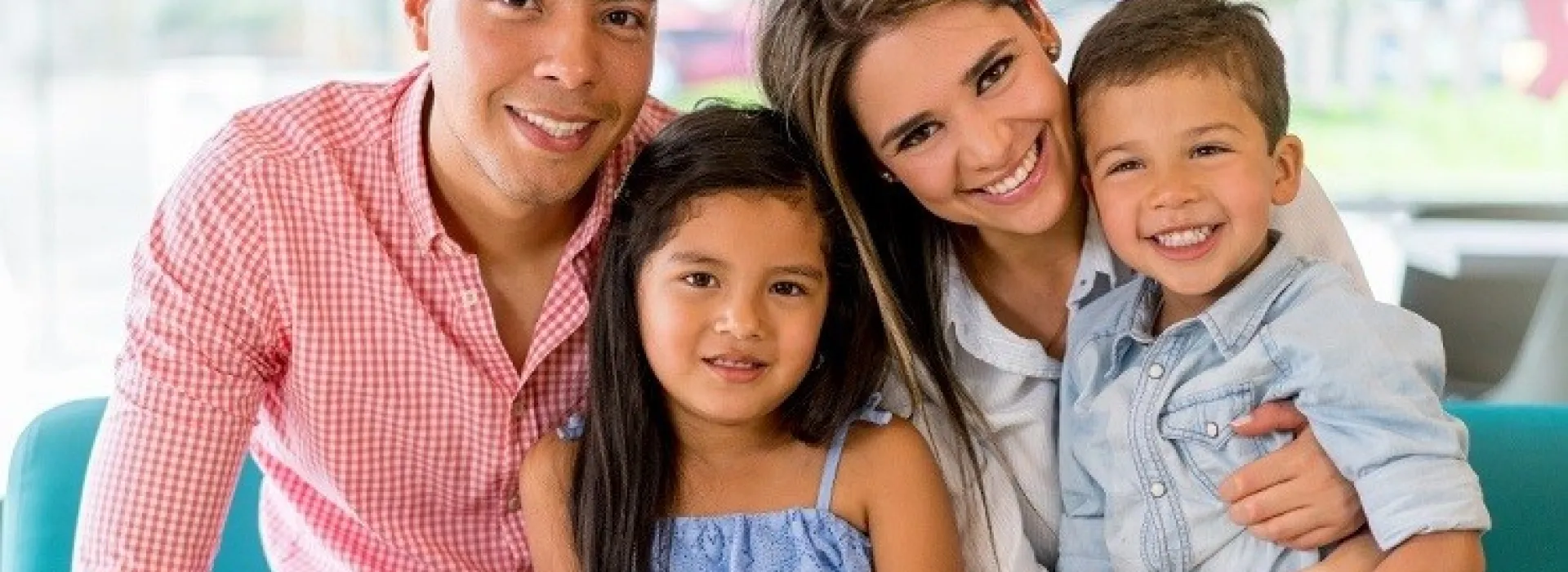 Family smiling for photo