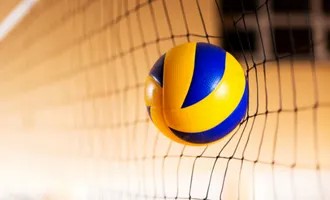 a volleyball hits an et