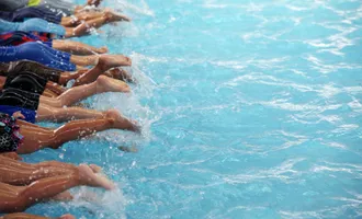 Kids taking swim lessons