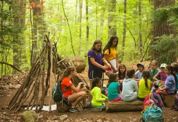 youth meeting in the woods at Camp Chickami