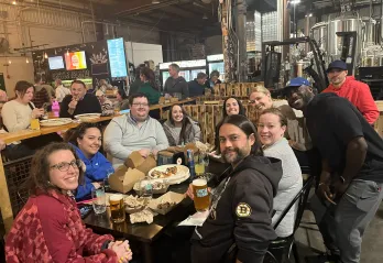 Group of WSYMCA members and friends in the Y Not? Club at Castle Island Brewery for trivia night
