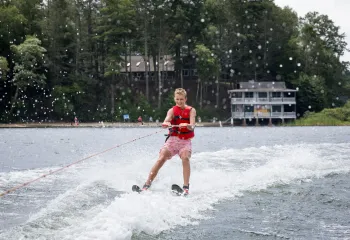 camper waterskiing at Camp Frank A. Day