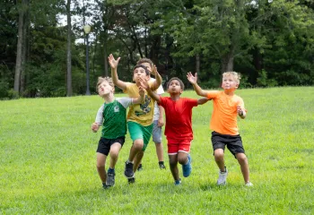 Camp Wells Campers having fun playing football