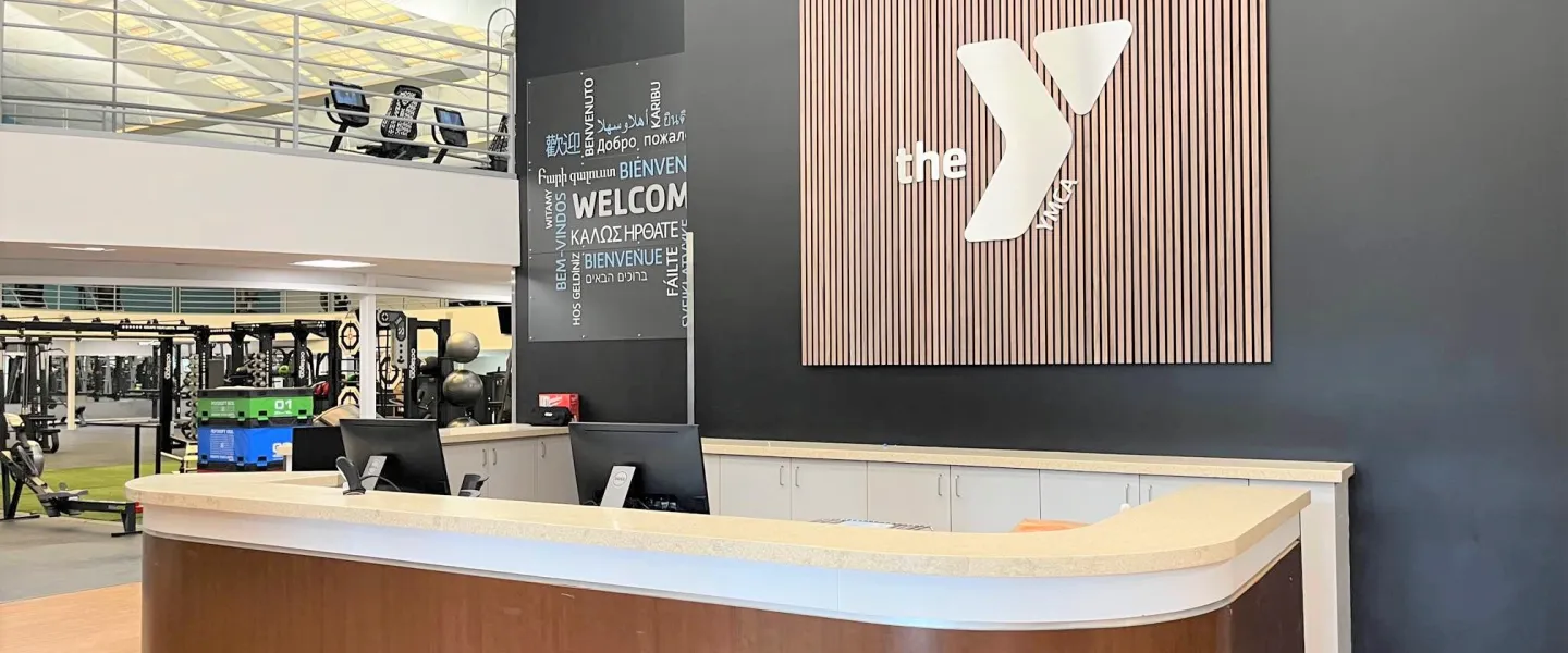 Wells Ave Y welcome desk