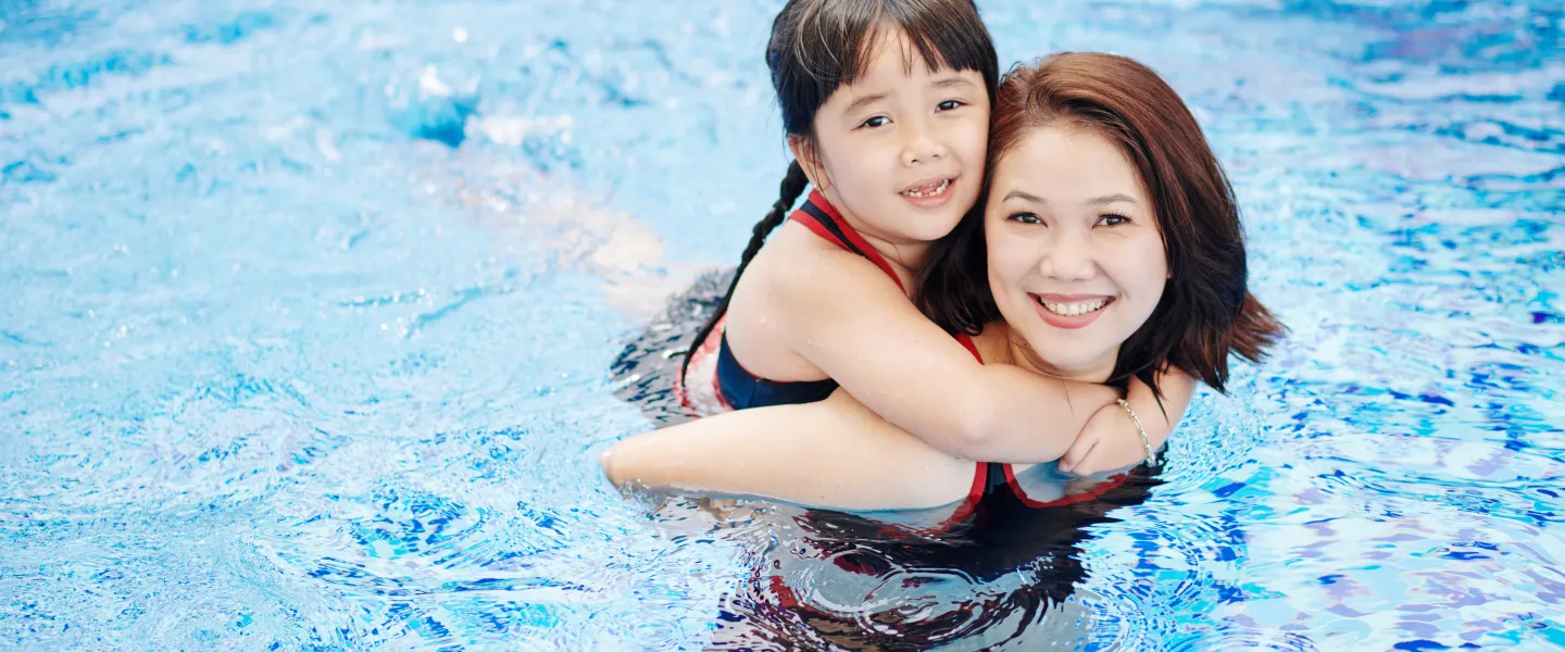 Mother and Daughter in the pool together