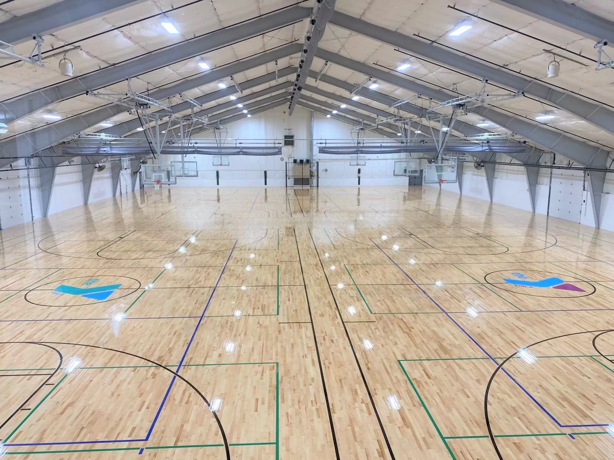 Picture of 4 indoor multi-purpose sport courts at the Wells Ave Y Field House