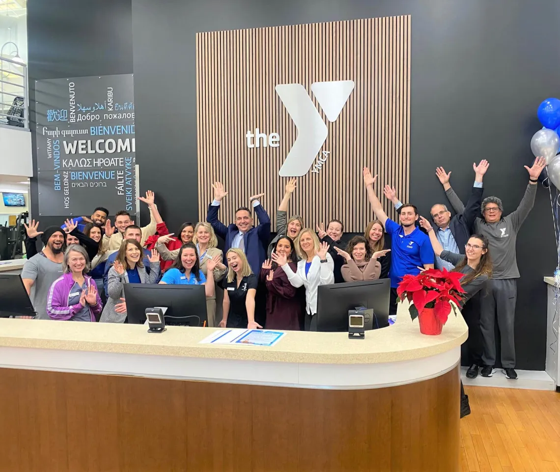 Group of WSYMCA staff at the opening of the Wells Ave Y