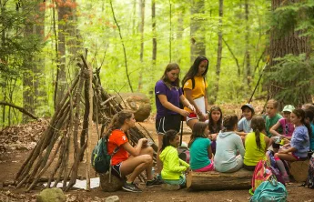 youth meeting in the woods at Camp Chickami