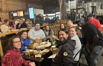 Group of WSYMCA members and friends in the Y Not? Club at Castle Island Brewery for trivia night