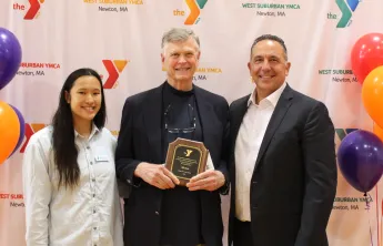 Staff receiving award at the West Suburban YMCA