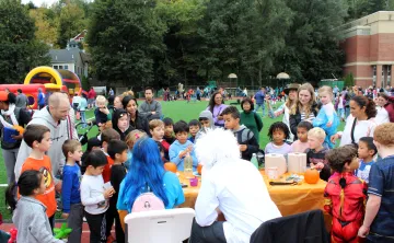 Fall Fest 2023, scientists showing group of kids experiments