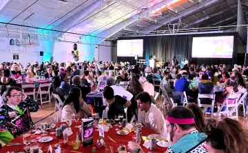 guests seated for dinner and the program at the 2024 Annual Gala at the Wells Ave Y