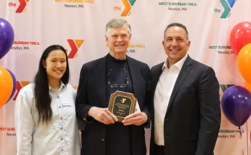 Staff receiving award at the West Suburban YMCA
