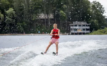 camper waterskiing at Camp Frank A. Day