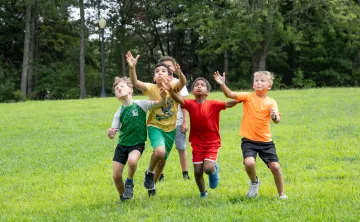 Camp Wells Campers having fun playing football
