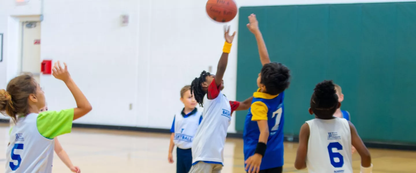 Youth playing basketball at the YMCA.