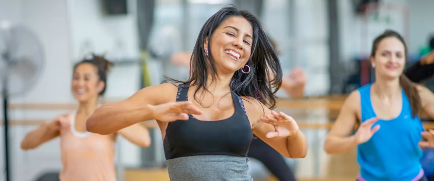 Woman dancing in group exercise at the YMCA