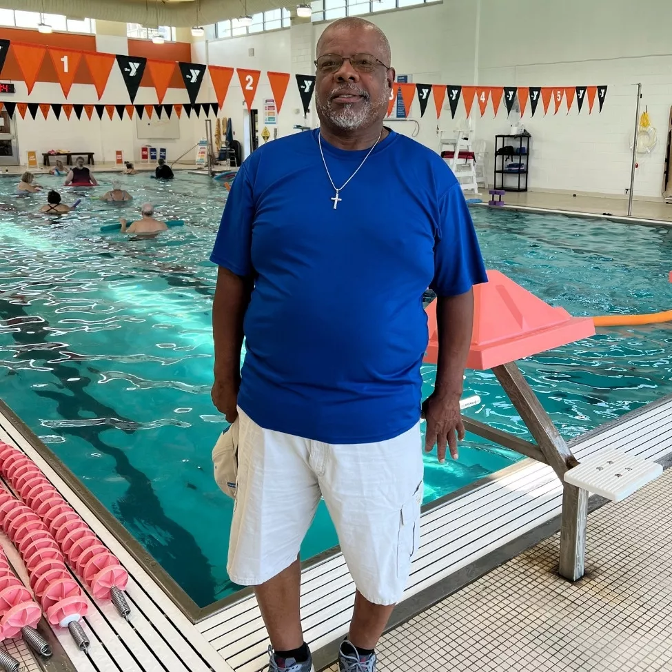 YMCA of Central KY member Bill Smith poses by the indoor swimming pool.