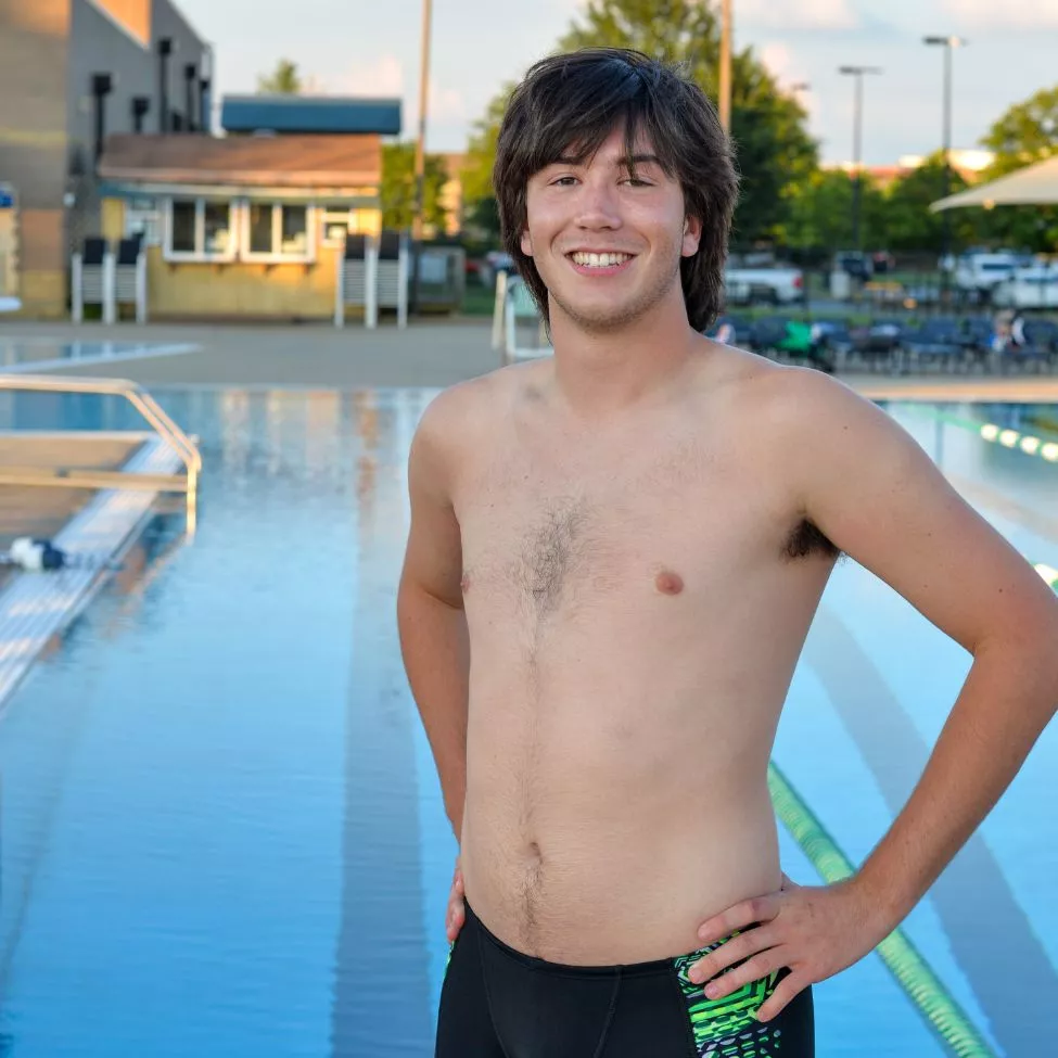 Senior Swimmer Hunter B poses by the pool at C.M. Gatton Beaumont YMCA.