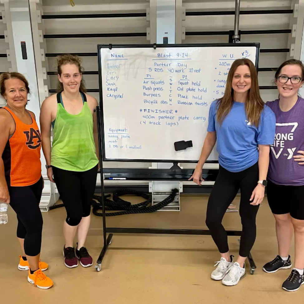 Paige W teaches a group class at the Whitaker Family YMCA