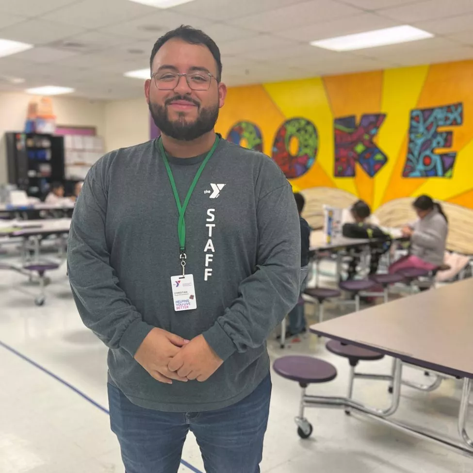 Youth Activities Coordinator Christian A. supervises the participants at the YMCA after school program.