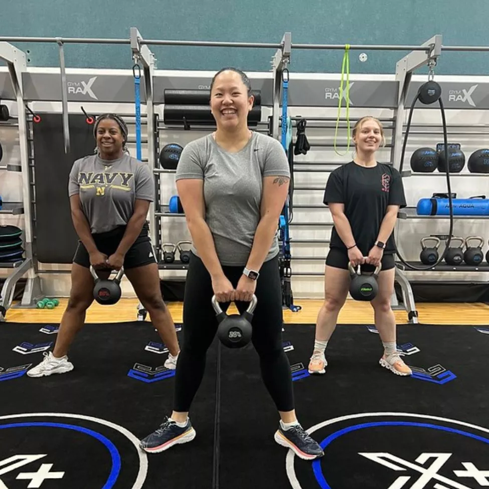 Three young women exercise at the High Street YMCA | YMCA of Central KY