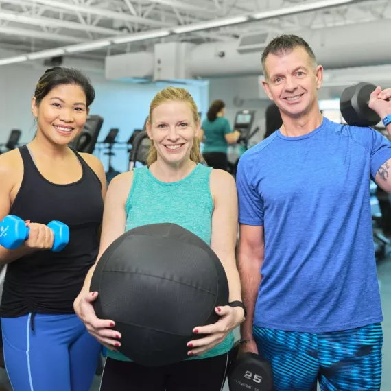 Three YMCA of Central KY members are ready to work out together.