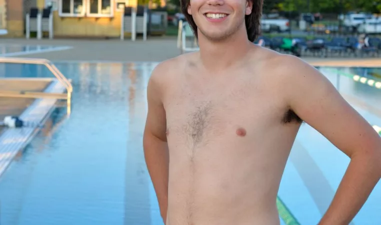 Senior Swimmer Hunter B poses by the pool at C.M. Gatton Beaumont YMCA.