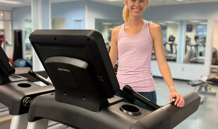 YMCA of Central KY member Anna prepares for a run on the treadmill at the High St. Y