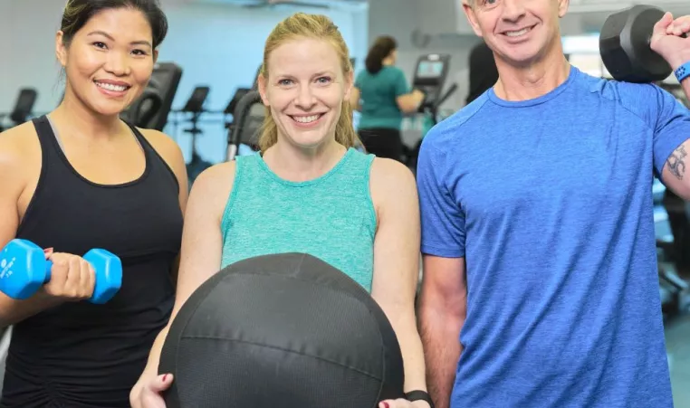 Three YMCA of Central KY members are ready to work out together.