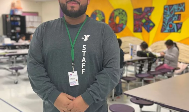 Youth Activities Coordinator Christian A. supervises the participants at the YMCA after school program.