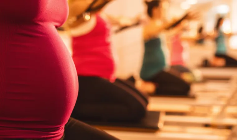 Learn the benefits of doing pilates while pregnant.