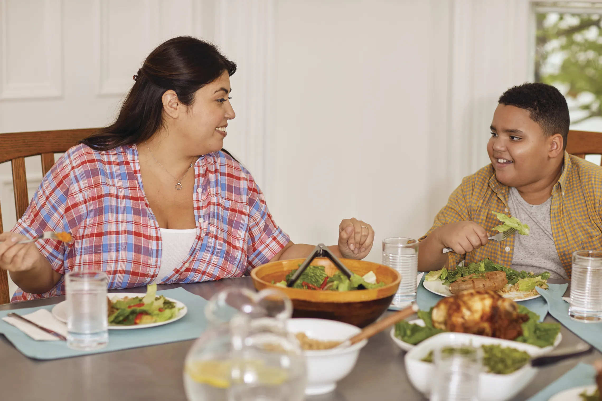 Mother and son dining