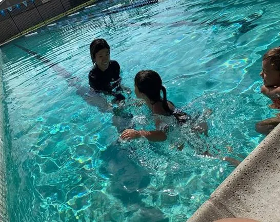 Child in swim class