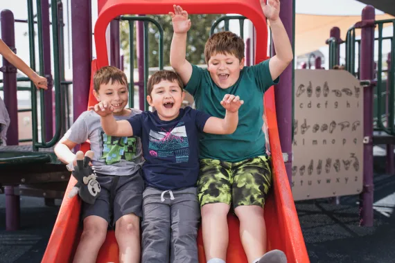 kids on a slide