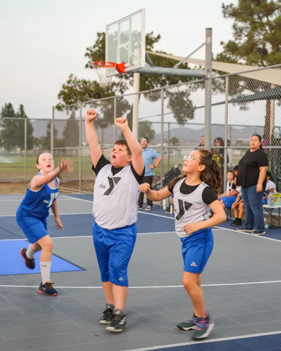 11-13 year olds playing basketball